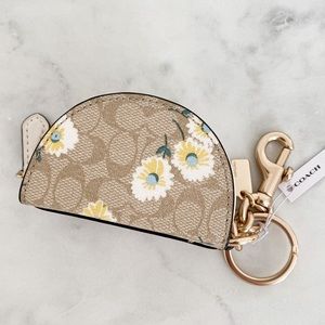 NWT Coach Crescent Pouch Bag Charm in Signature Canvas with Daisy Print